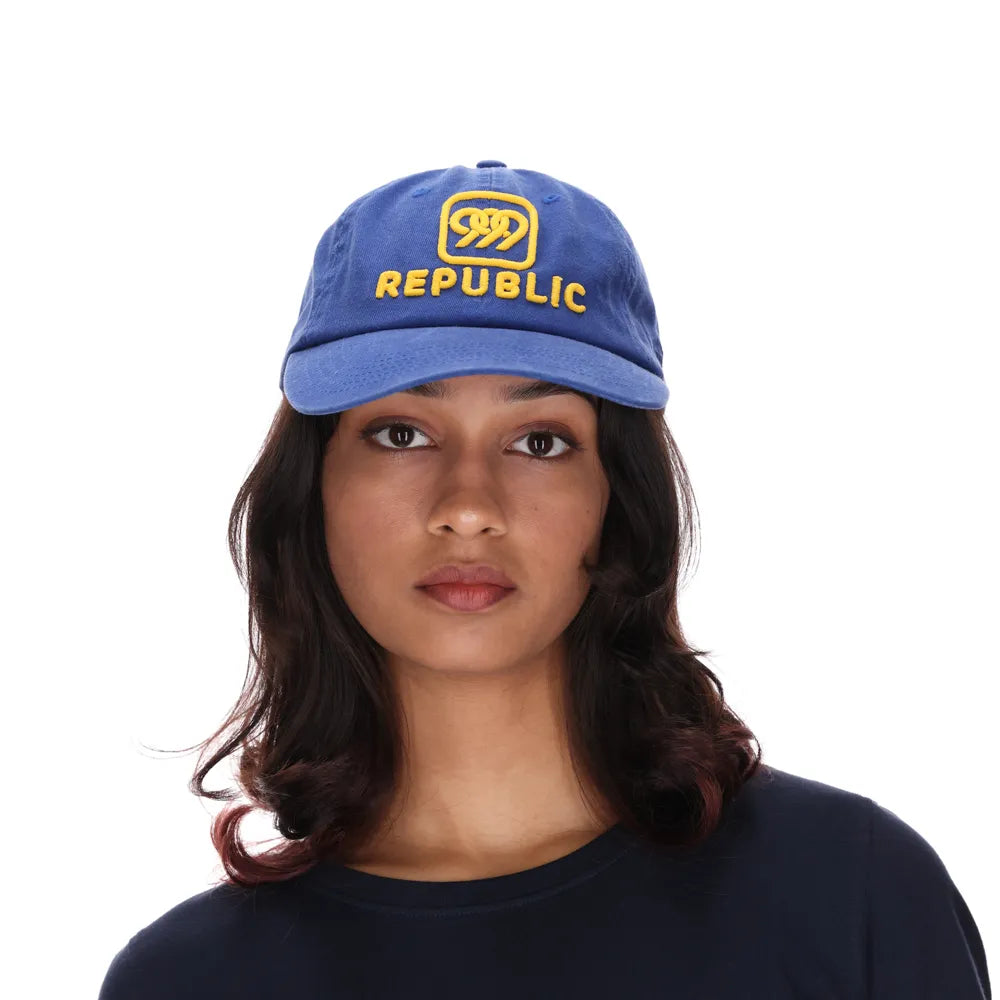 999Republic logo embroidered with gold matt finish thread on a Blue coloured Dad cap