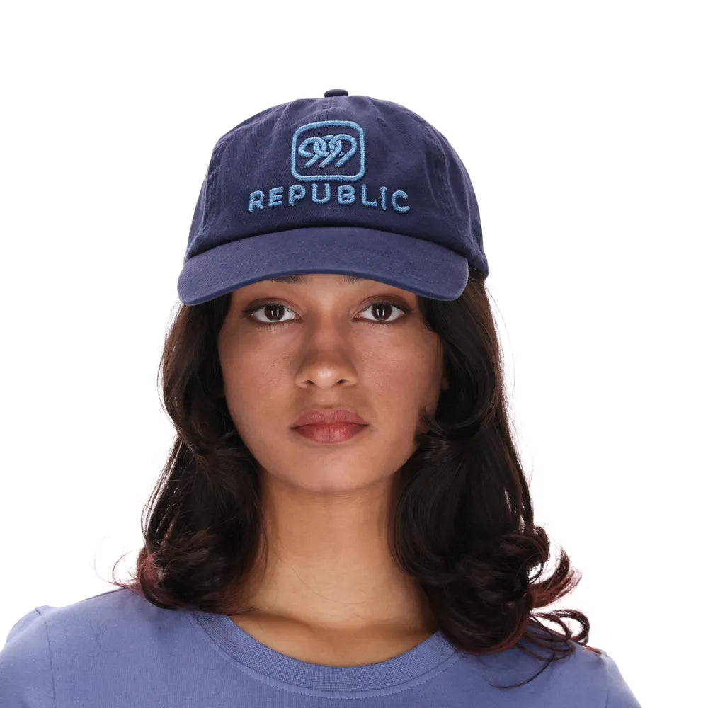 999Republic logo embroidered with Blue Metallic Thread on a Navy coloured Dad cap.