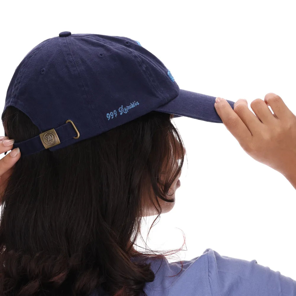 999Republic logo embroidered with Blue Metallic Thread on a Navy coloured Dad cap.